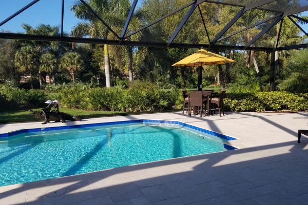 Pool cage screen repair in Naples, FL.