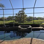 Aluminum Master technician providing free estimate for screen enclosure in Naples Florida