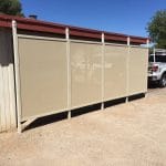 Carport screen enclosure in Naples, FL with UV-blocking mesh installed by Aluminum Master LLC.